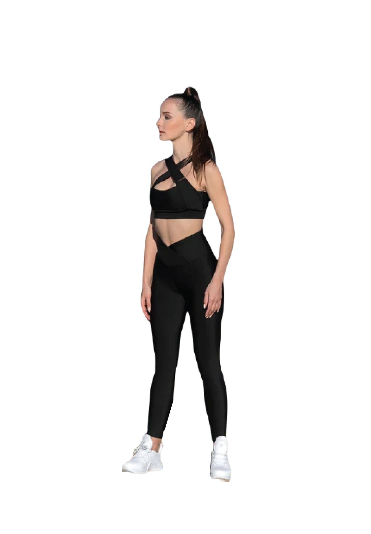 Frau im schwarzen Lismina-Sportoutfit und weißen Sneakers, Highlights der 1033 Extra High Waist Leggings in Schwarz.